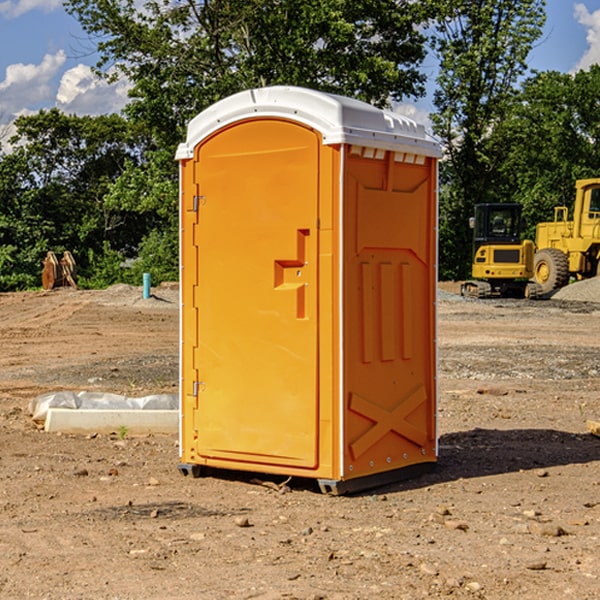 how often are the portable restrooms cleaned and serviced during a rental period in Rush Valley